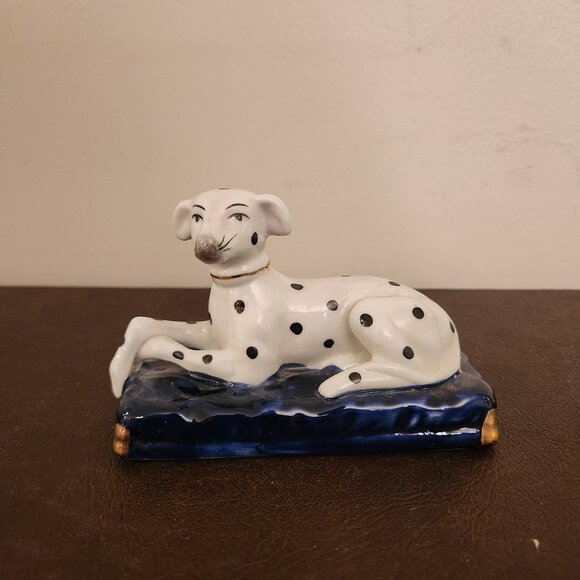 antique Staffordshire dog Dalmatian figurine features gold corners and a collar